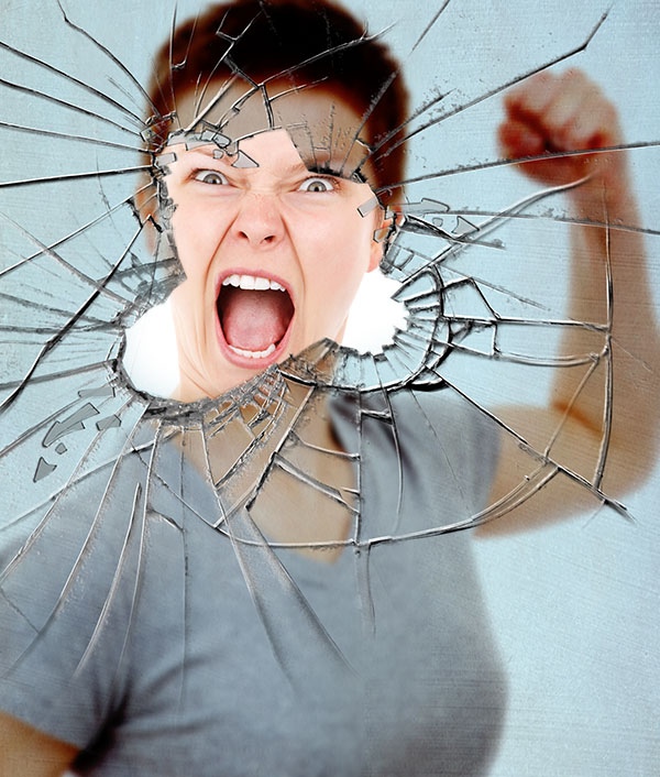 FInal effect angry woman punching glass