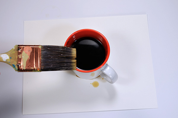 Apply the coffee to the rim with a brush or sponge