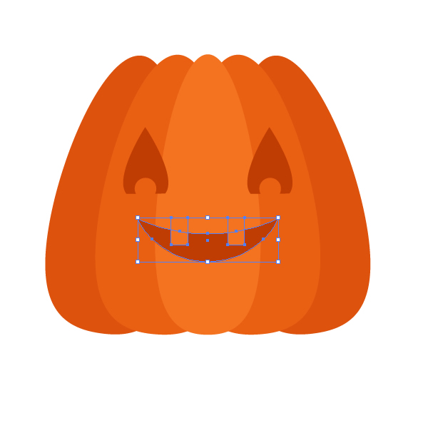 placing the mouth and teeth on the pumpkin