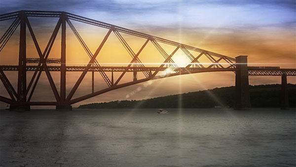 The final look of a sunset scene behind the bridge uses a lens flare to create the sun