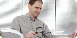 Man with magnifying glass