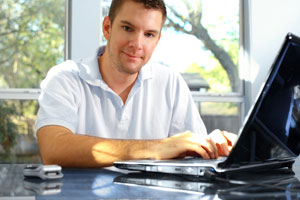 Man working from home using laptop