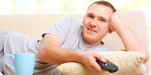 Adult with a remote control